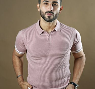 Textured knitted polo Mauve T-shirt with black trousers.