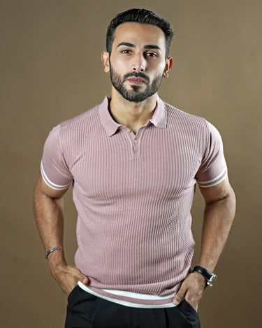 Textured knitted polo Mauve T-shirt with black trousers.